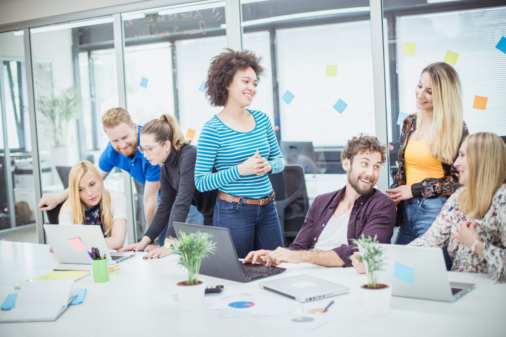 A diverse team collaborating in a bright modern office.
