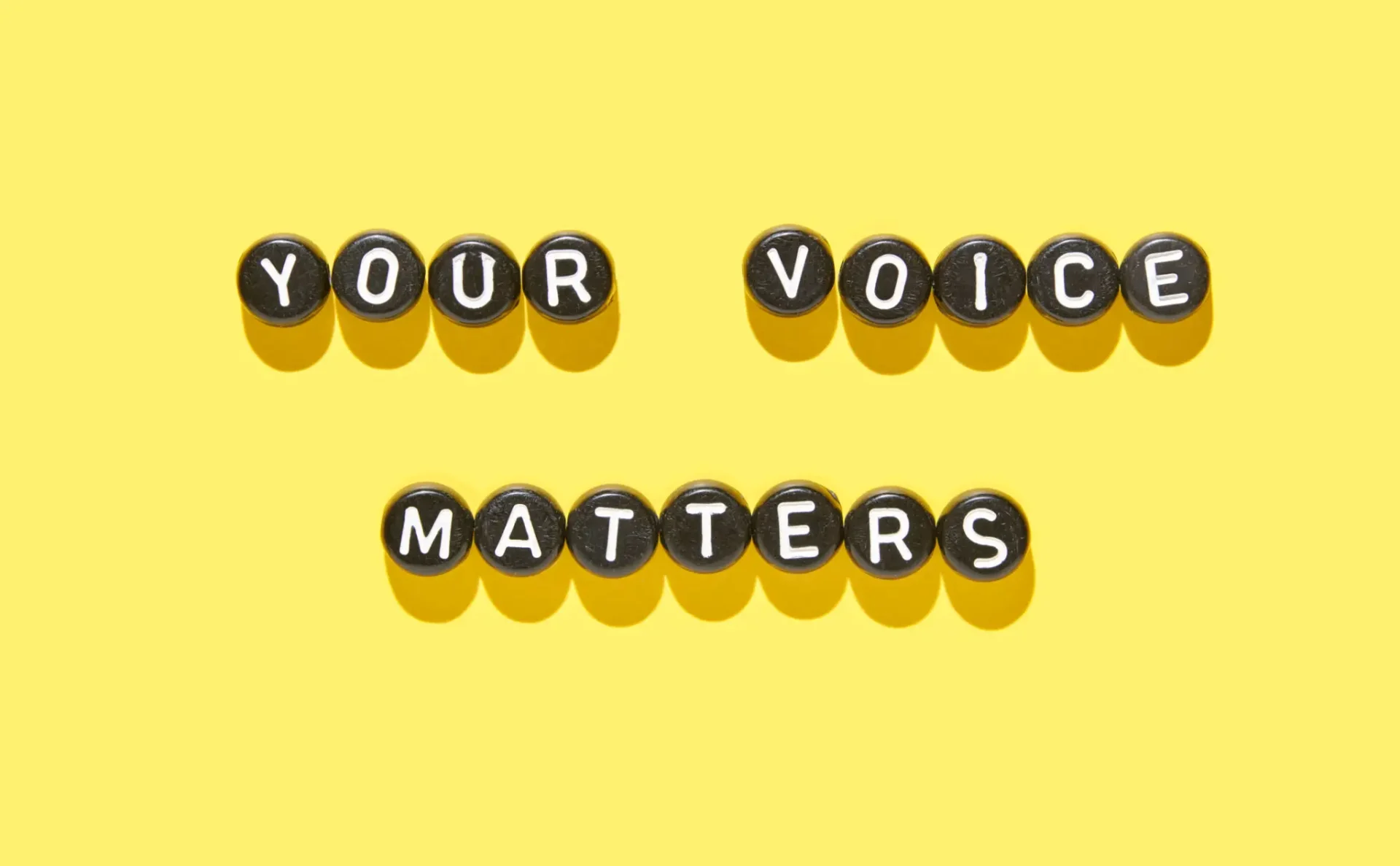 Message saying 'Your Voice Matters' on a yellow background.